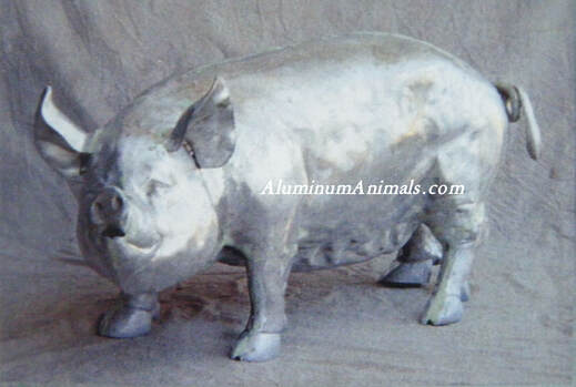 life sized pig sculptures