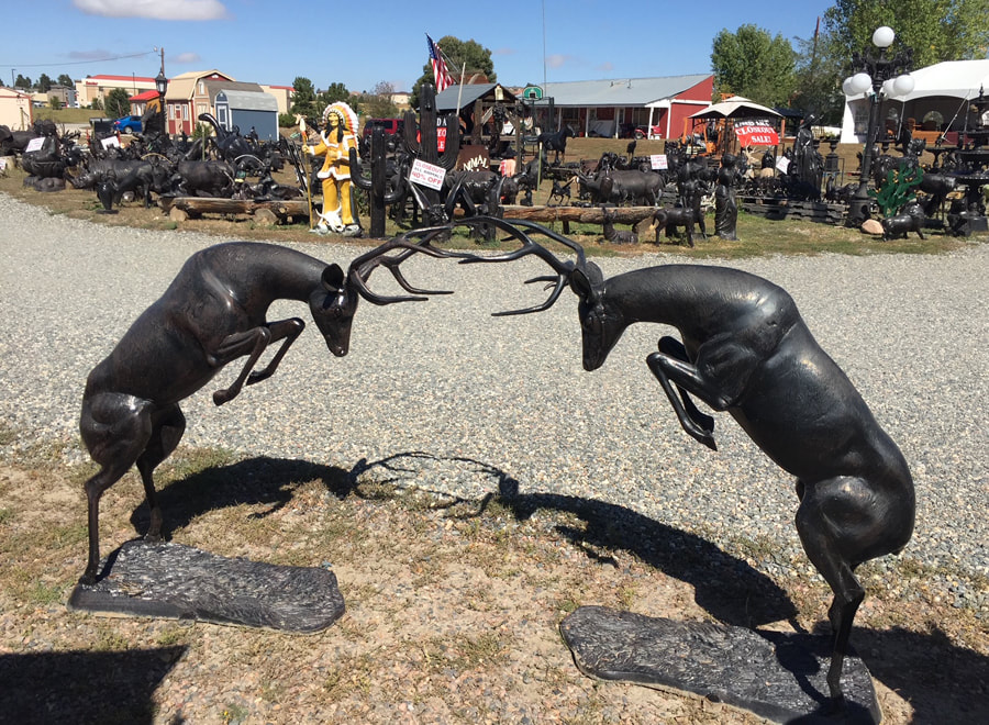 rearing fighting deer buck statues
